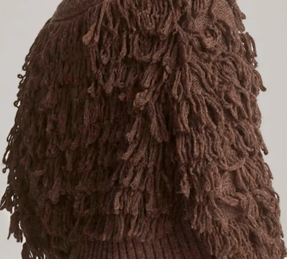 Strickjacke mit Fransen - ein Ausdruck von Mut und Stilgefühl
