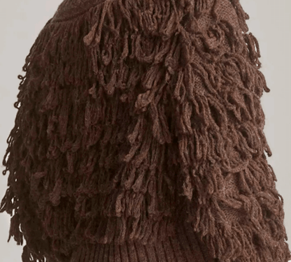Strickjacke mit Fransen - ein Ausdruck von Mut und Stilgefühl